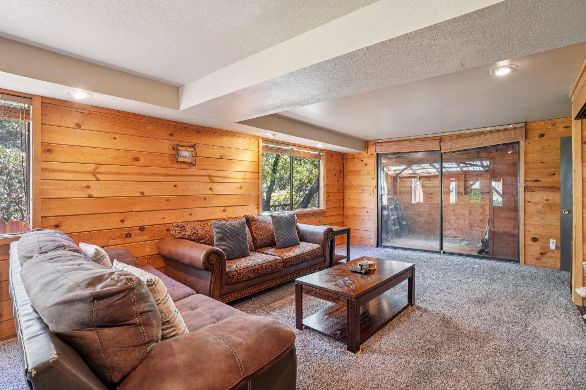 24800 Marion Ridge Drive Idyllwild, CA 92549 - Photo 31 of 39 a living room with furniture and a large window