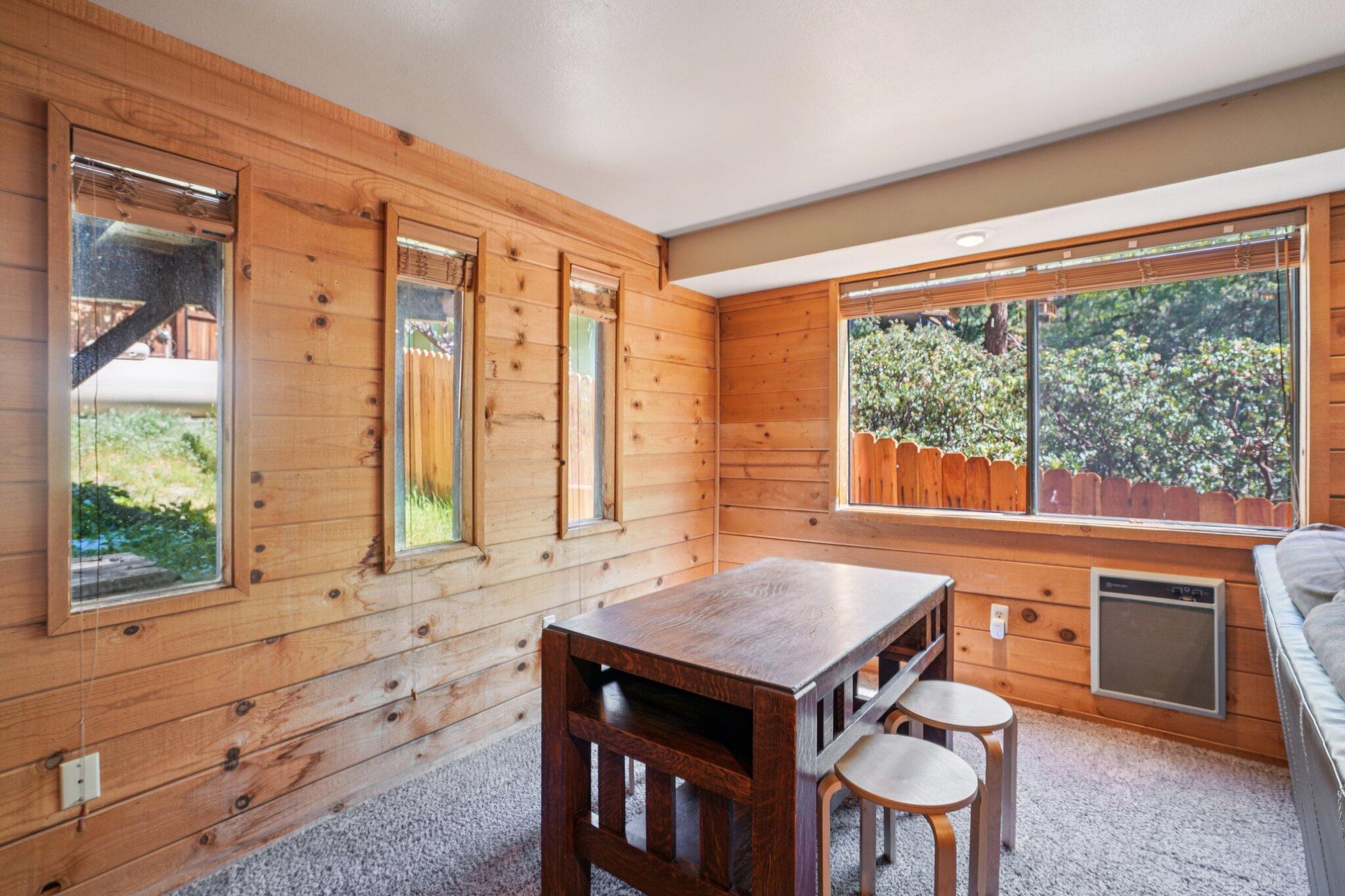 24800 Marion Ridge Drive Idyllwild, CA 92549 - Photo 32 of 39 a view of a kitchen with a table and chairs