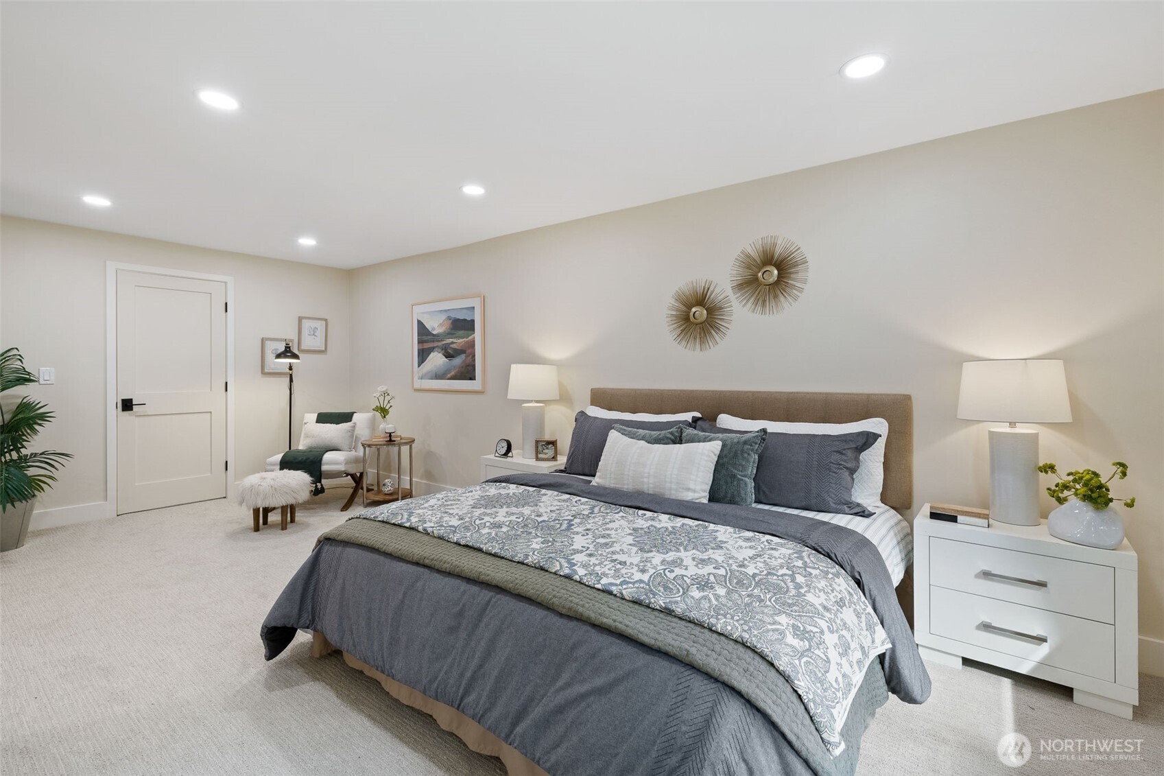 22017 1st Place West Bothell, WA 98021 - Photo 11 of 28 a spacious bedroom with a bed and a couch