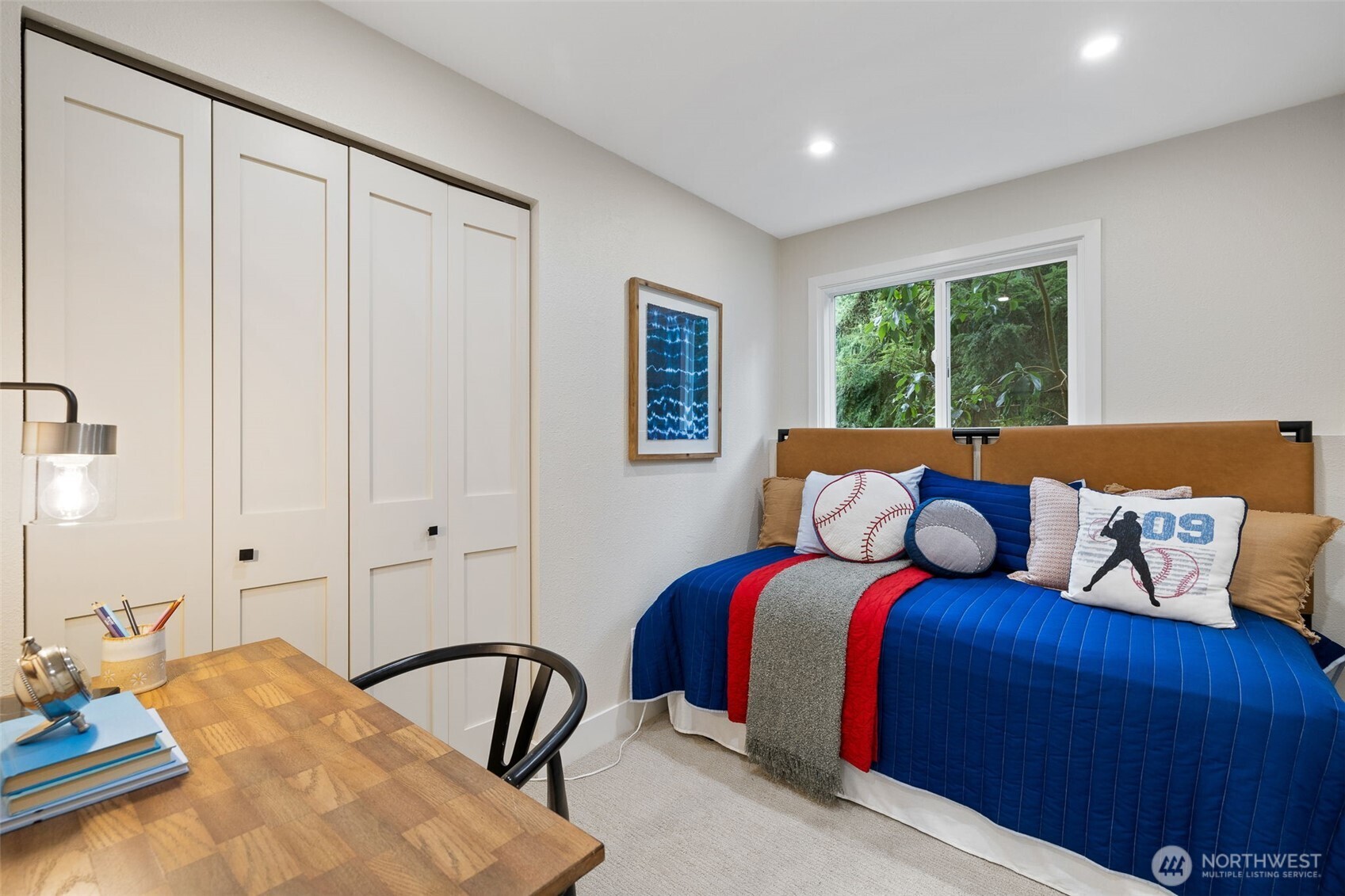 22017 1st Place West Bothell, WA 98021 - Photo 15 of 28 a bedroom with bed and a window