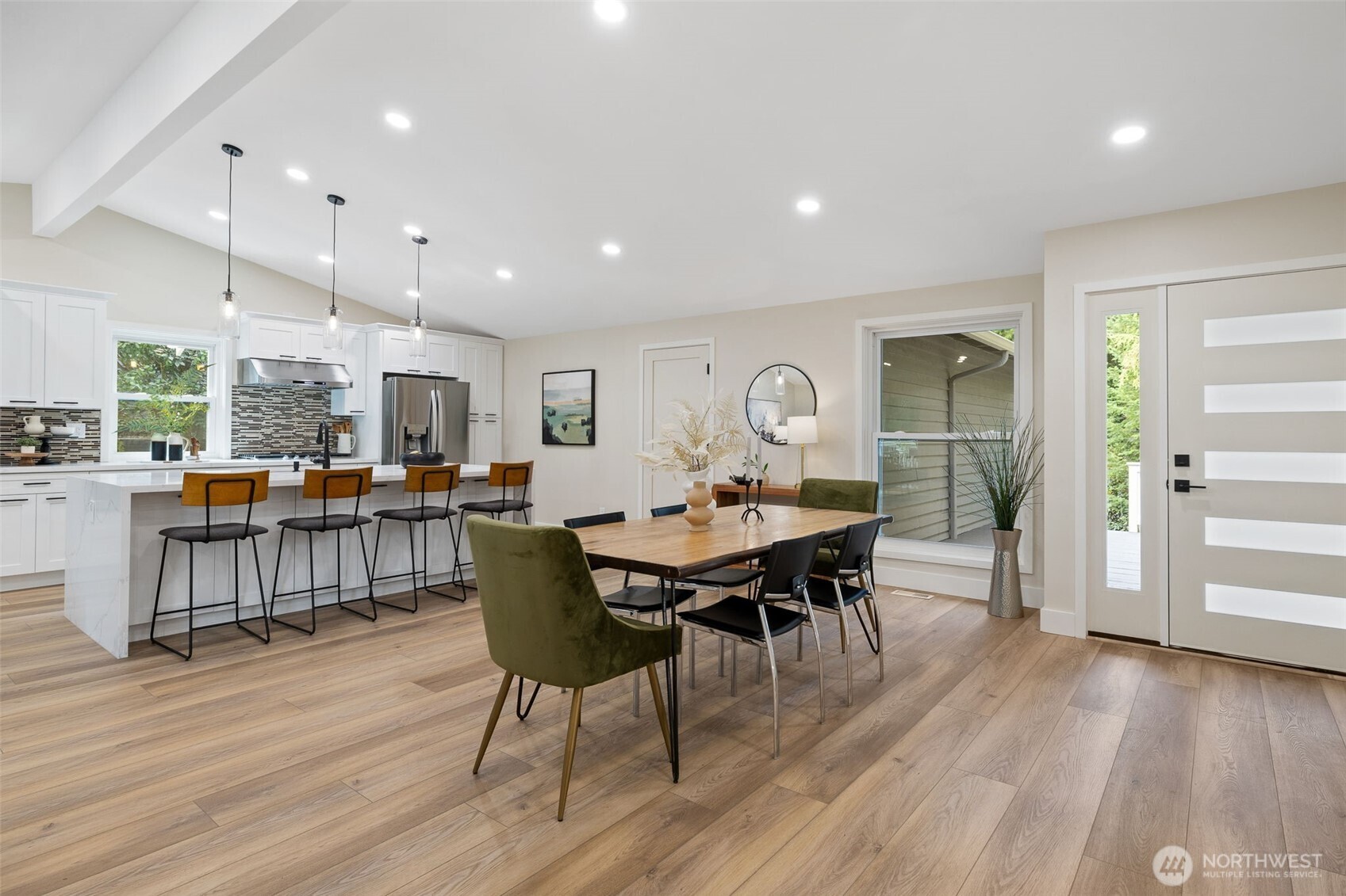 22017 1st Place West Bothell, WA 98021 - Photo 6 of 28 a view of a dining room with furniture and wooden floor