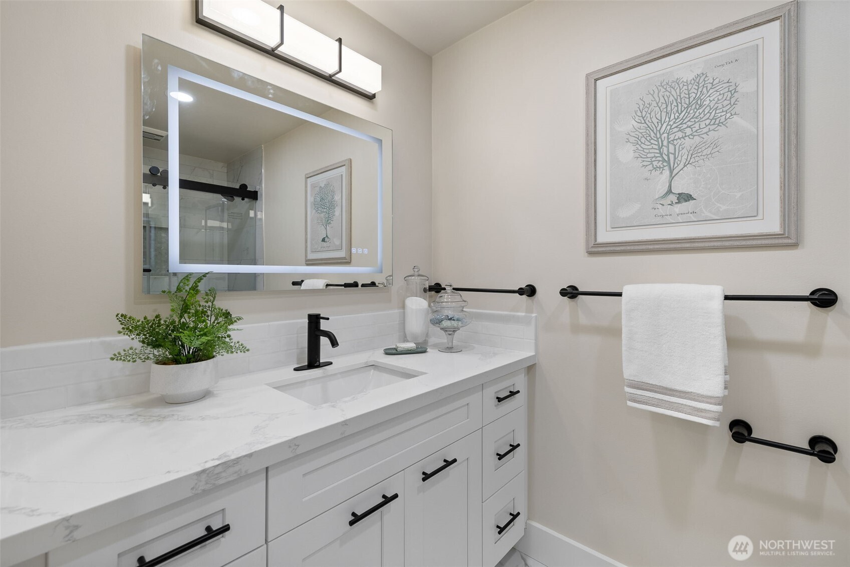 22017 1st Place West Bothell, WA 98021 - Photo 9 of 28 a bathroom with a sink and a mirror
