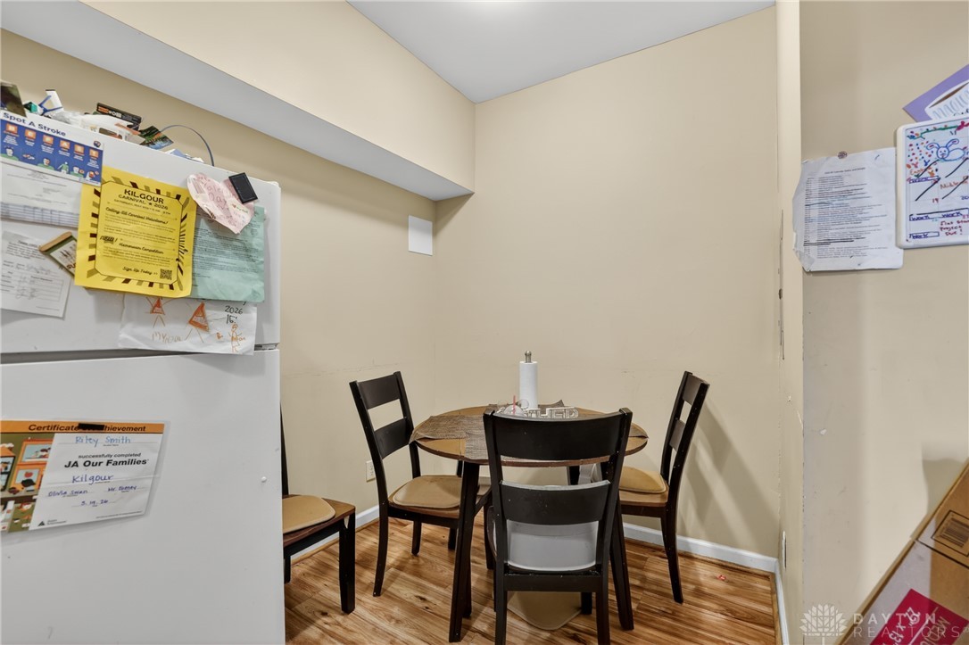 7045-7049 Montgomery Road Cincinnati, OH 45236 - Photo 26 of 68 This cozy dining area features warm flooring and ample space for intimate gatherings.