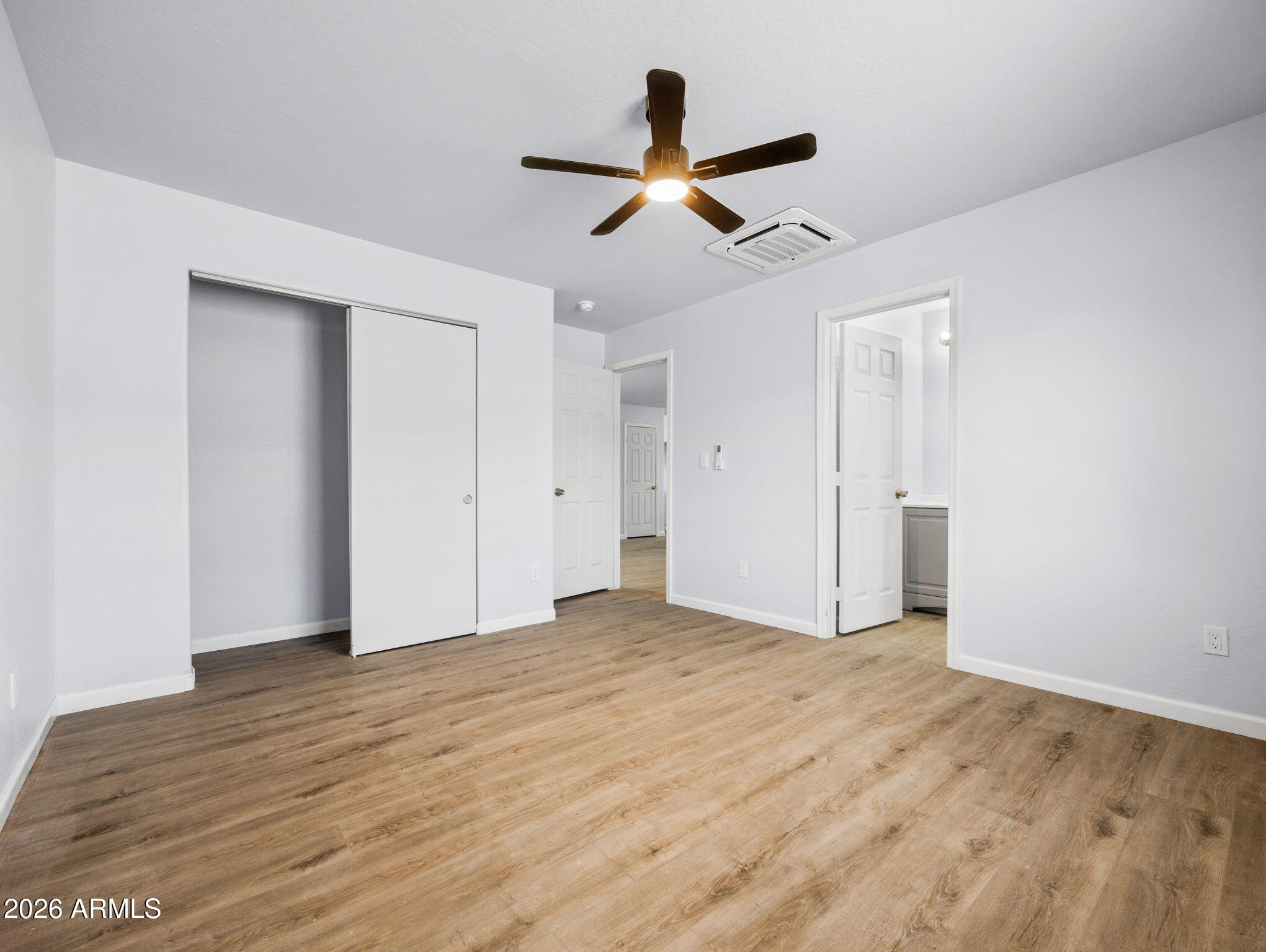 18278 Frontier Road Peeples Valley, AZ 86332 - Photo 24 of 31 a view of empty room with wooden floor