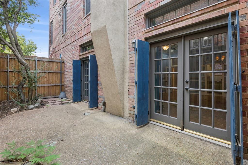 4511 Gilbert Avenue, Unit 103 Dallas, TX 75219 - Photo 32 of 35 a view of an entrance door of the house