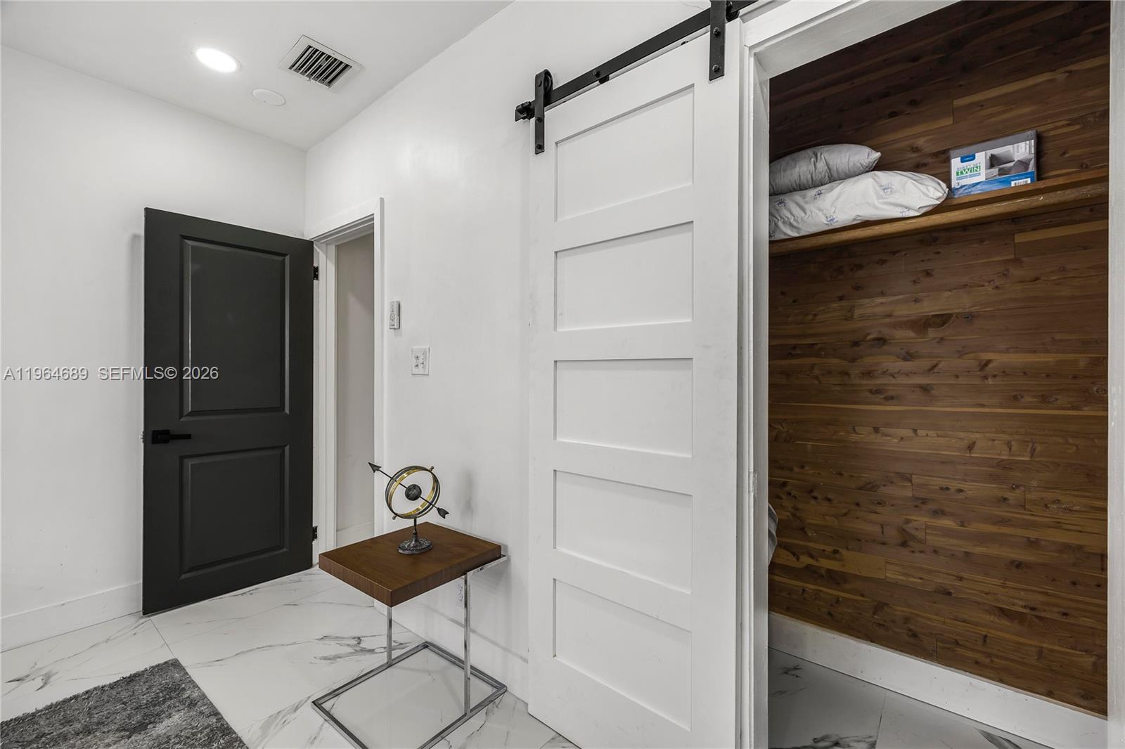 285 Northwest 45th Street Miami, FL 33127 - Photo 28 of 39 a bathroom with a shower and a sink