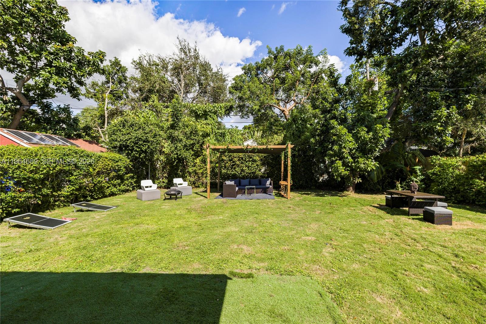 285 Northwest 45th Street Miami, FL 33127 - Photo 35 of 39 a view of a swimming pool with a patio