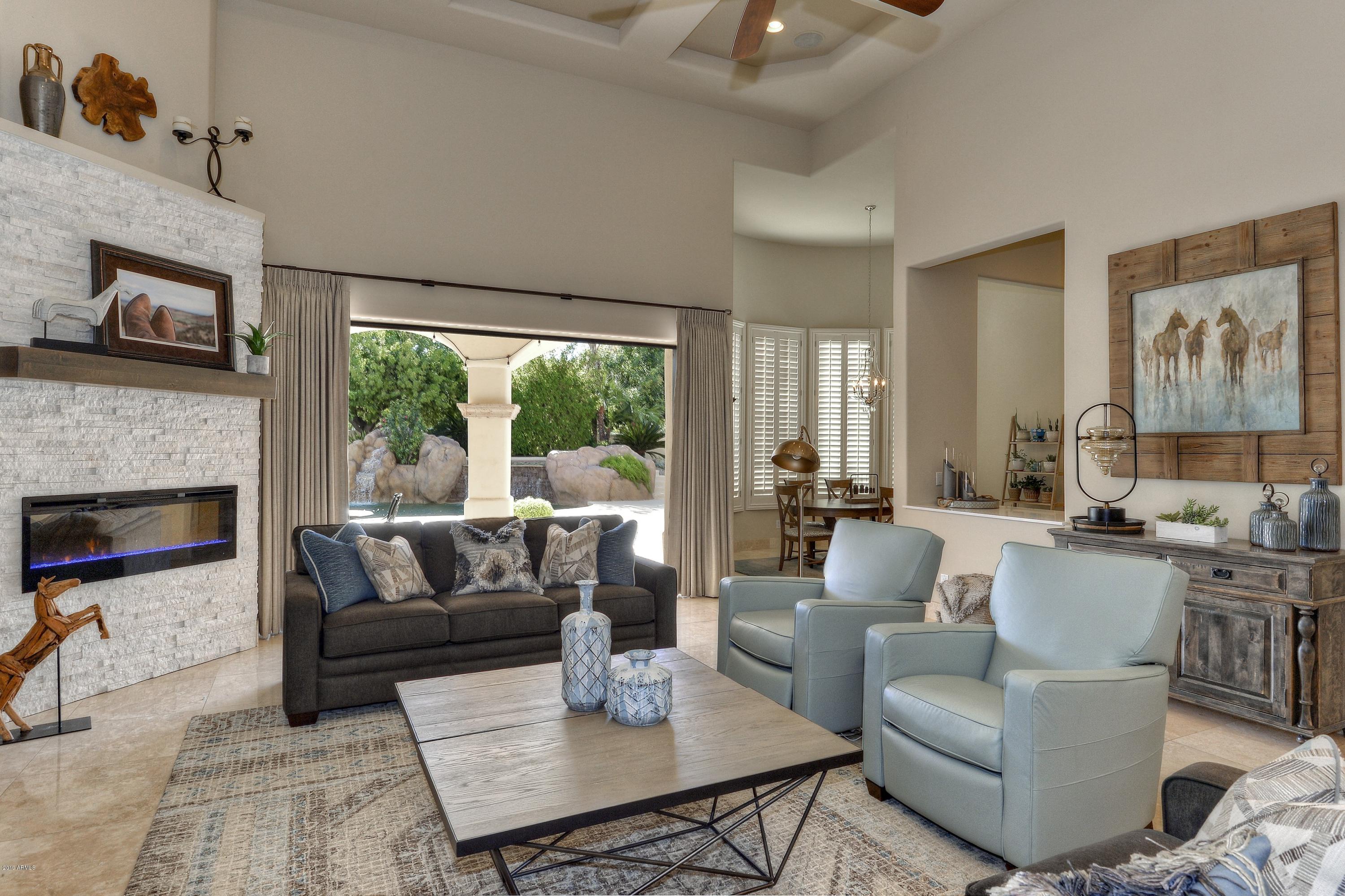 8217 North Coconino Road Paradise Valley, AZ 85253 - Photo 8 of 51 008_Family Room Opens to Outdoors