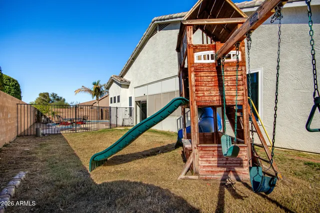 a view of a house with wooden stairs