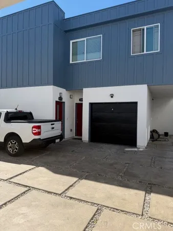 a car parked in front of a house
