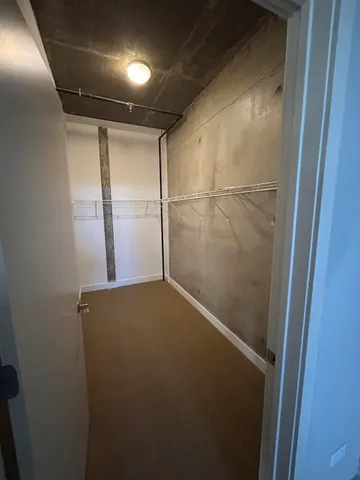 a bathroom with a sink a mirror and a shower