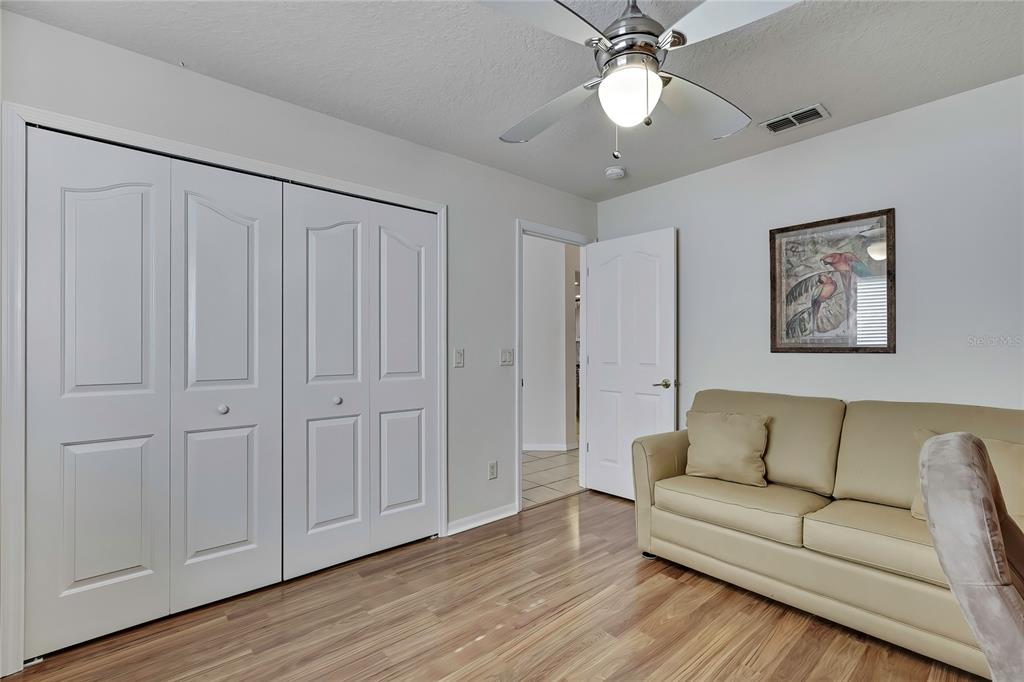 3786 South Emma Jane Terrace Homosassa, FL 34448 - Photo 17 of 32 a living room with furniture and a ceiling fan