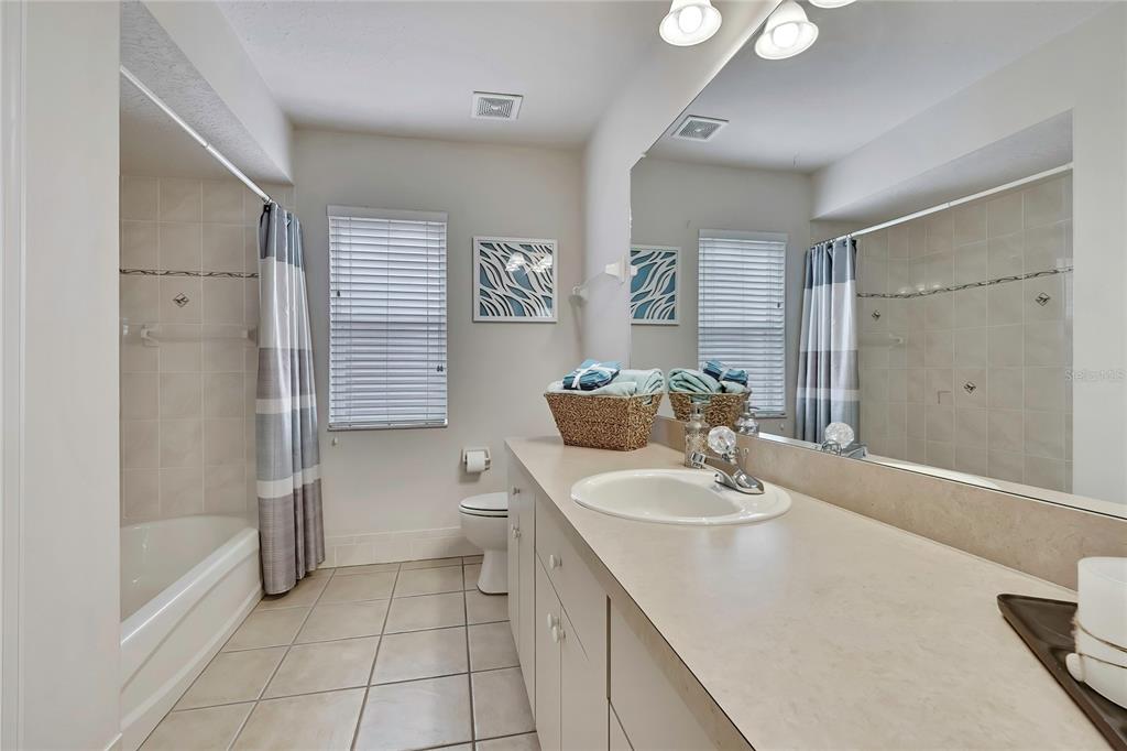 3786 South Emma Jane Terrace Homosassa, FL 34448 - Photo 21 of 32 a bathroom with a sink a toilet and shower