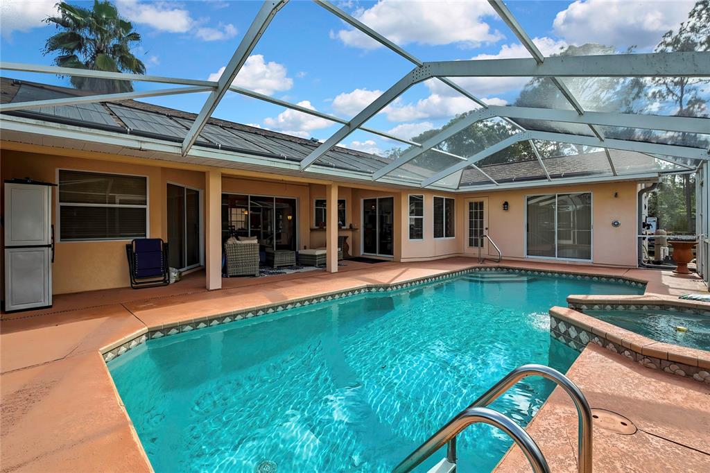 3786 South Emma Jane Terrace Homosassa, FL 34448 - Photo 24 of 32 a view of a house with backyard and porch