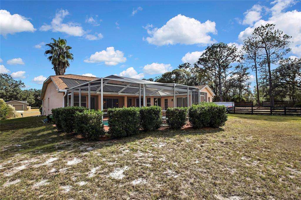 3786 South Emma Jane Terrace Homosassa, FL 34448 - Photo 27 of 32 a view of a house with a yard
