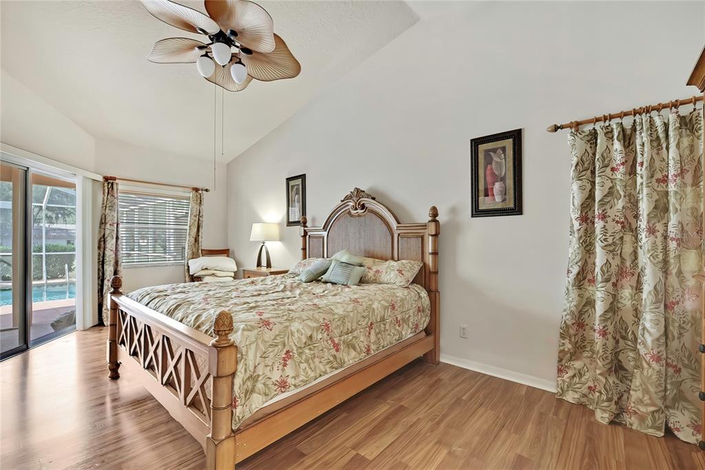 3786 South Emma Jane Terrace Homosassa, FL 34448 - Photo 7 of 32 a bed sitting in a bedroom next to a window