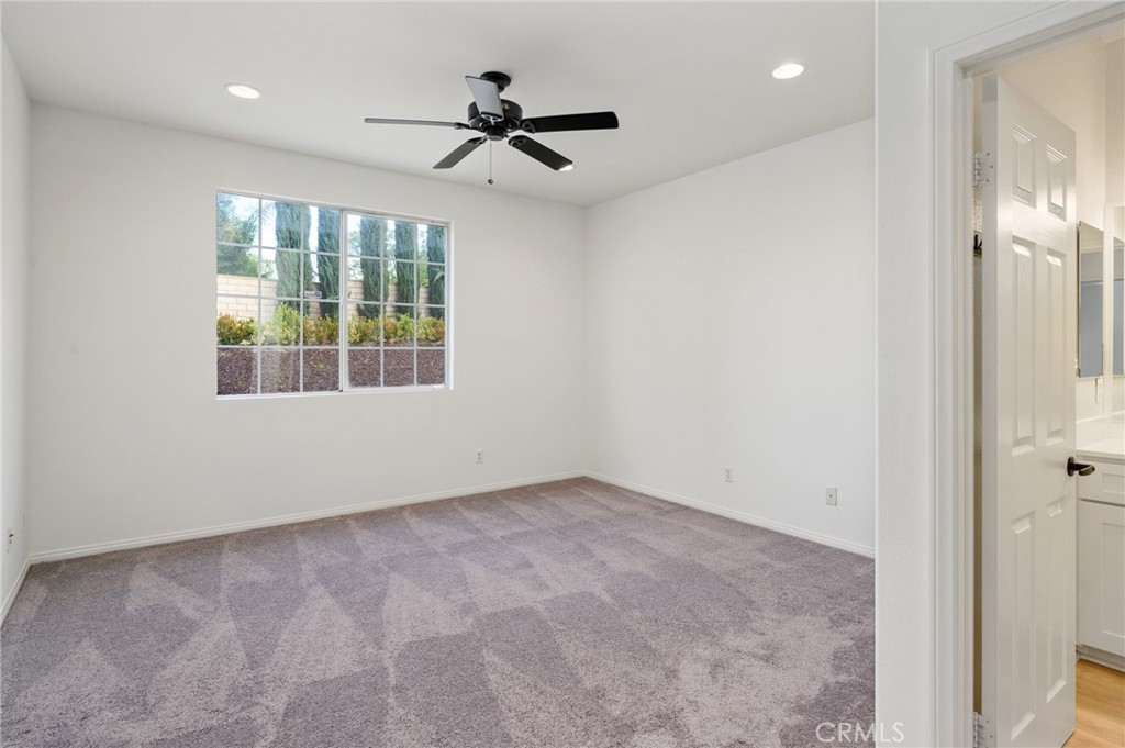 403 Jenny Circle Corona, CA 92882 - Photo 17 of 41 a view of an empty room with a window