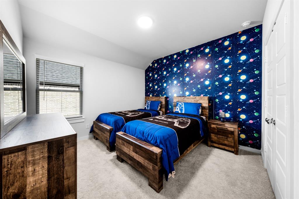 1012 Breezy Street Princeton, TX 75407 - Photo 19 of 34 a bedroom with a bed and window