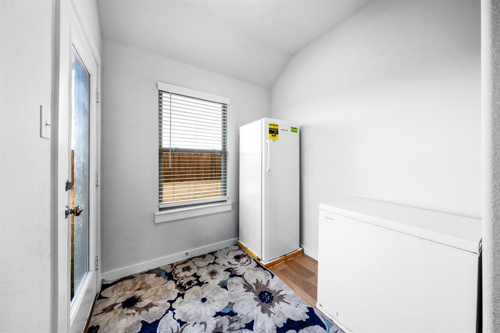 1012 Breezy Street Princeton, TX 75407 - Photo 26 of 34 a bedroom with a bed and a window