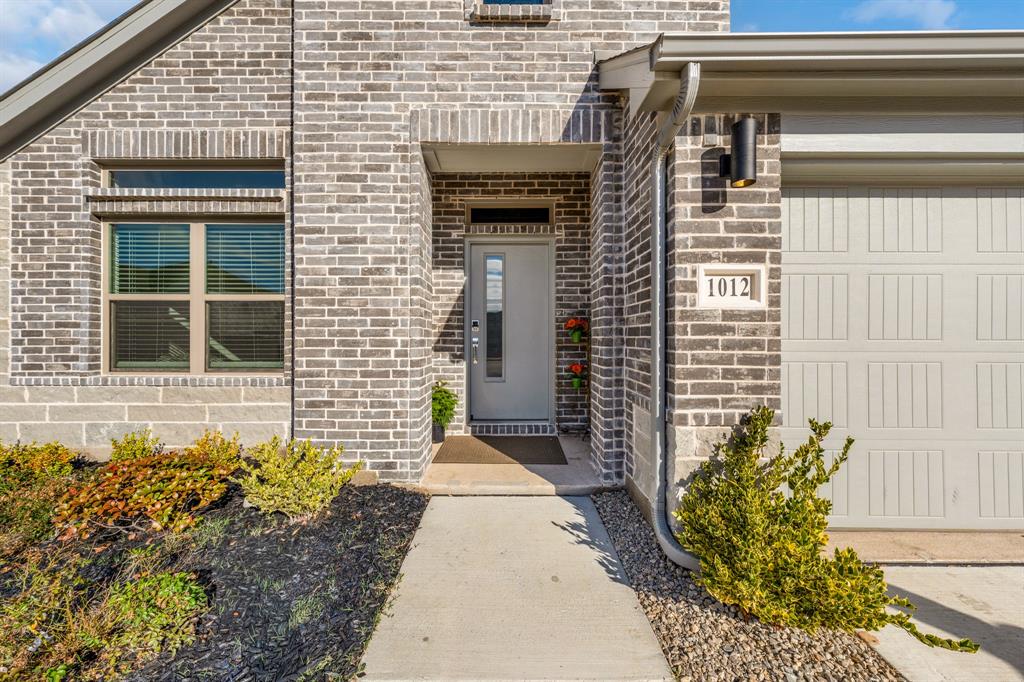 1012 Breezy Street Princeton, TX 75407 - Photo 28 of 34 a front view of a house
