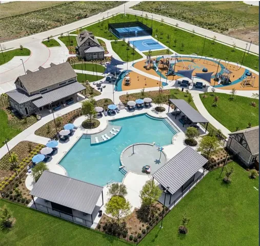 an aerial view of a house with outdoor space swimming pool and outdoor seating