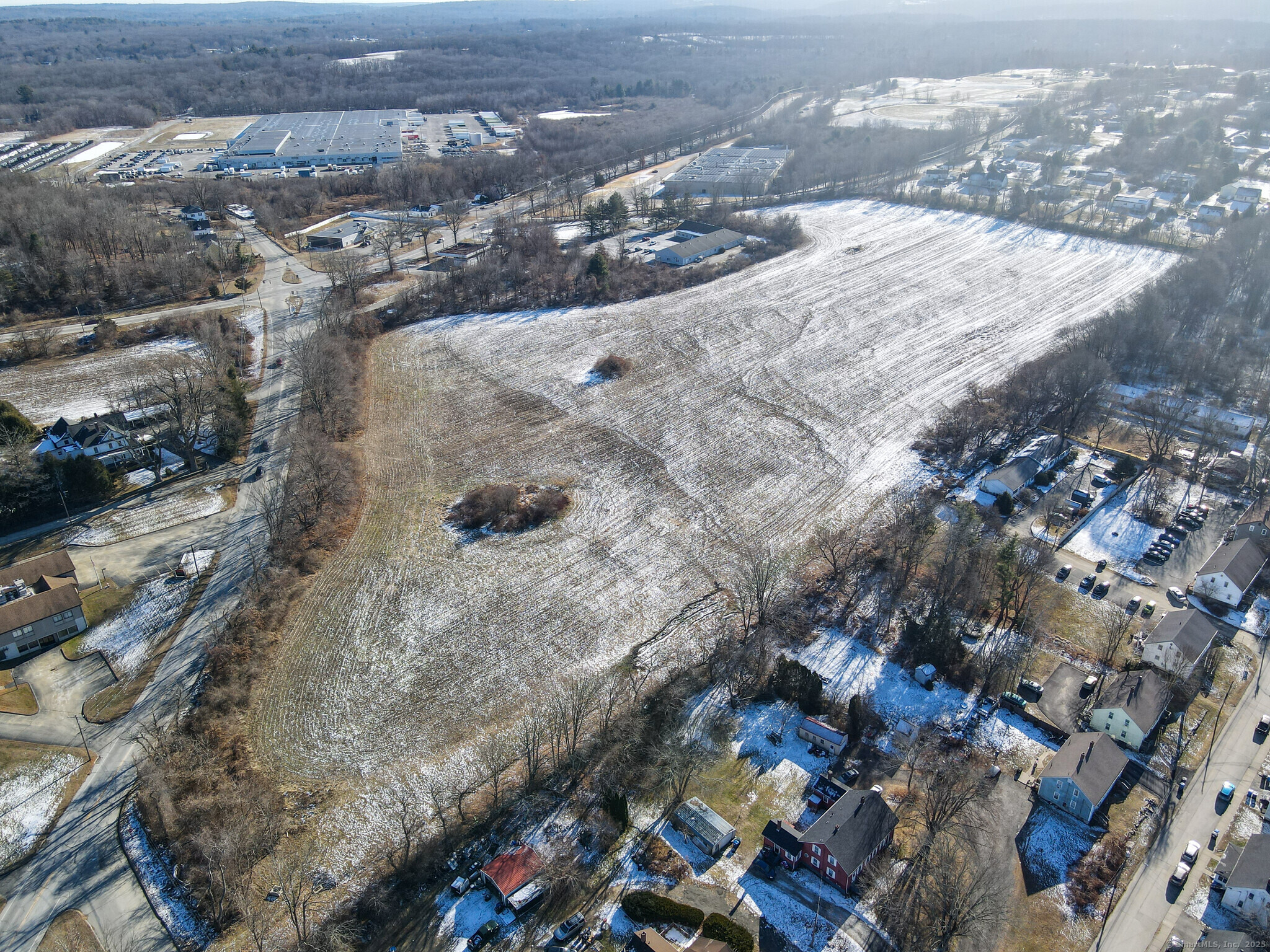Wauregan Road Canterbury, CT 06331 - Photo 8 of 9 an aerial view of residential houses with outdoor space