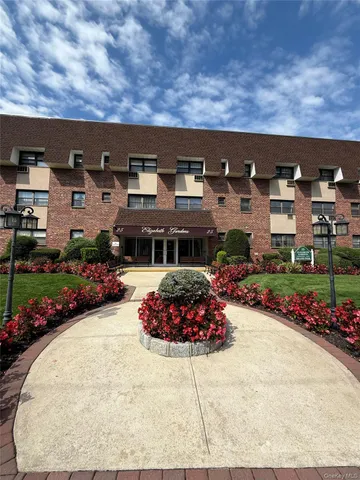 an outdoor view of house with outdoor seating