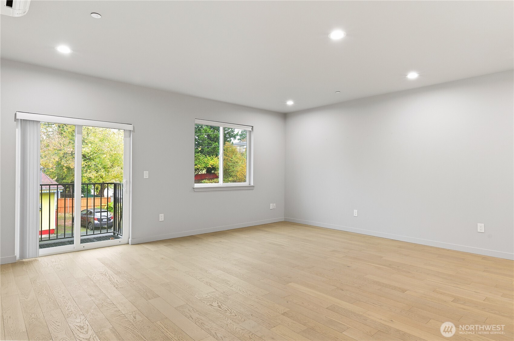 11825 59th Avenue South, Unit B Seattle, WA 98178 - Photo 9 of 18 an empty room with windows