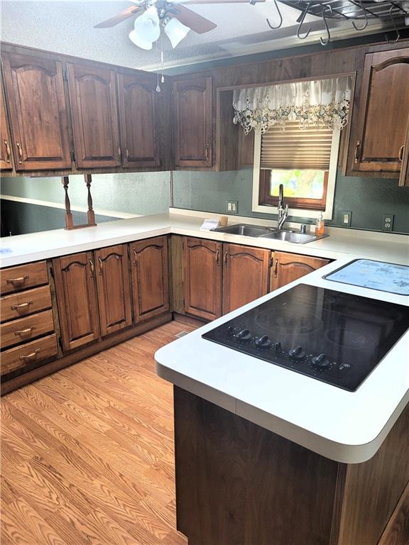 735 Cardinal Lane Apollo, PA 15613 - Photo 4 of 20 a kitchen with wooden cabinets a sink and a stove
