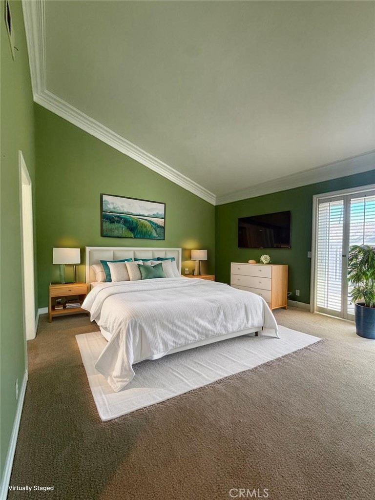 33665 Via Lagos Dana Point, CA 92629 - Photo 16 of 23 a spacious bedroom with a bed and a large window