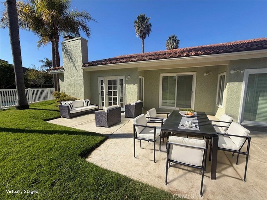 33665 Via Lagos Dana Point, CA 92629 - Photo 9 of 23 a view of a house with backyard porch and sitting area