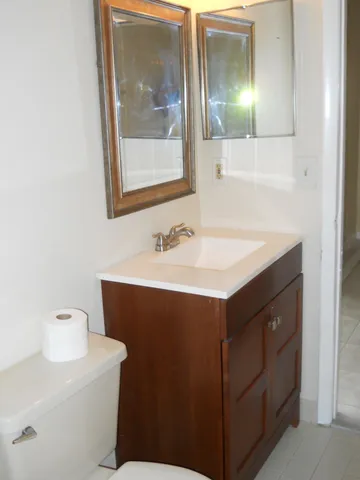 a bathroom with a sink and a shower