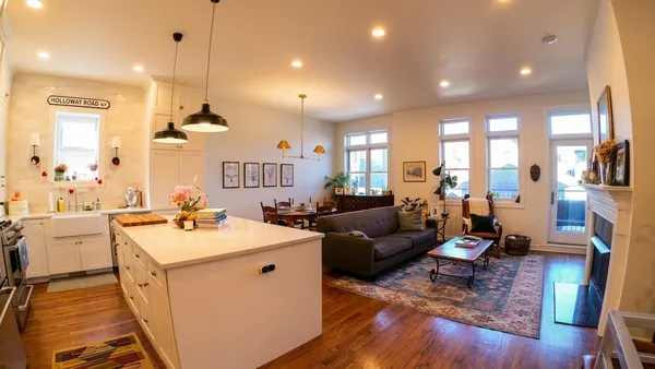a open kitchen with stainless steel appliances granite countertop a stove and cabinets