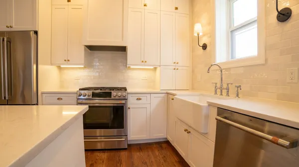 a kitchen with a sink stove and refrigerator