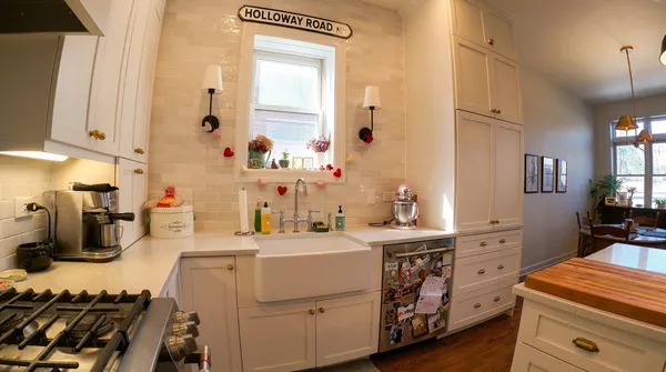 a kitchen with a sink stove and cabinets