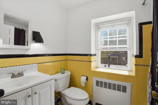 a bathroom with a sink and a toilet