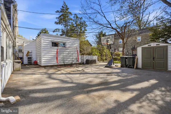 a view of a backyard of the house
