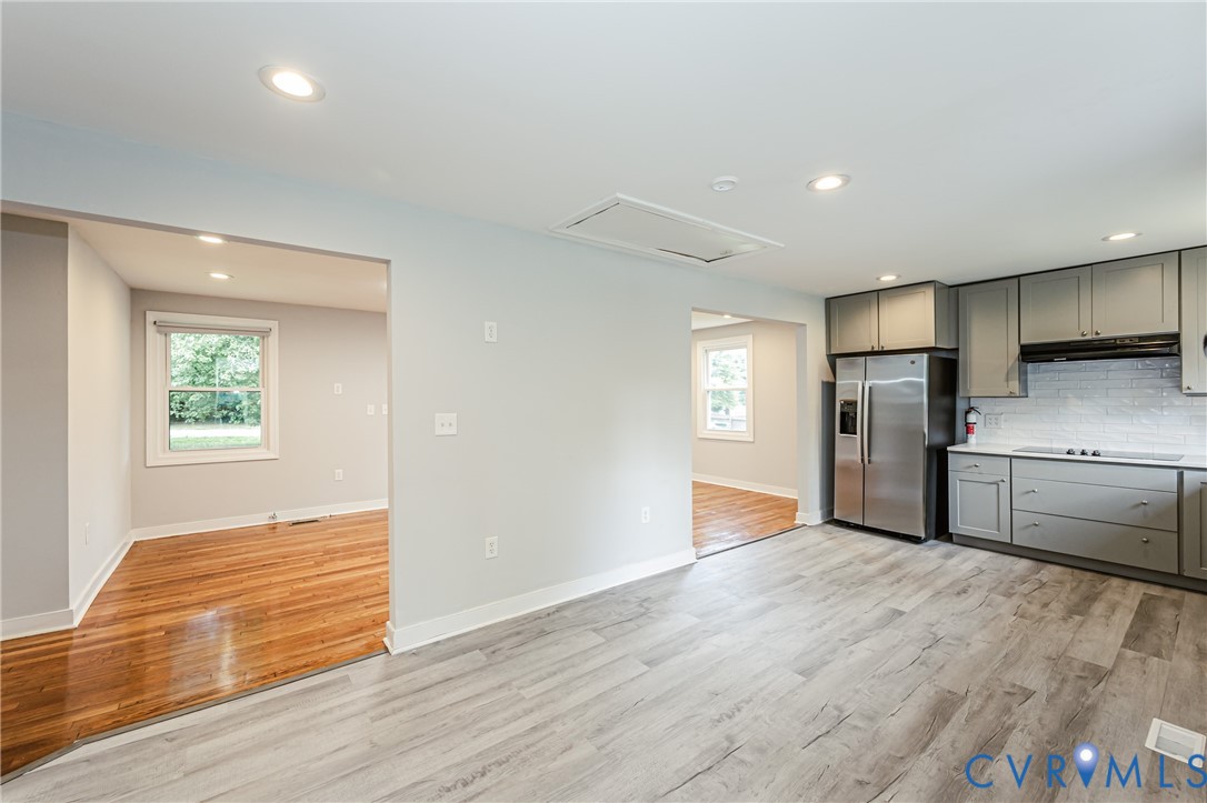 2015 Fordson Road Richmond, VA 23229 - Photo 17 of 48 Modern kitchen featuring grey cabinetry, stainless