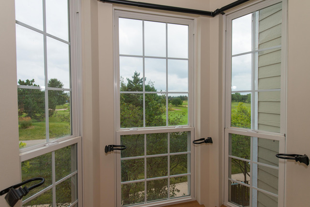 2422 Courtyard Circle, Unit 3 Aurora, IL 60506 - Photo 4 of 25 a view of a door and a window
