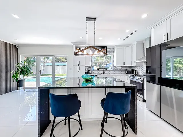 a bedroom with a bed and a mirror