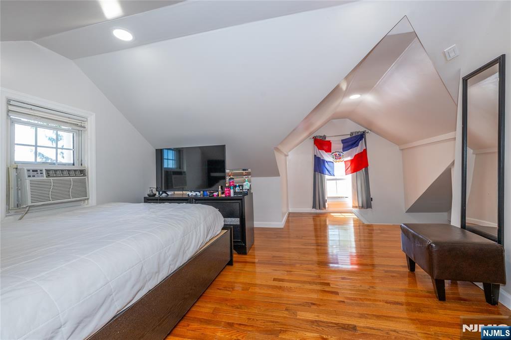 690 Garden Street Maywood, NJ 07607 - Photo 37 of 49 a bedroom with bed and window