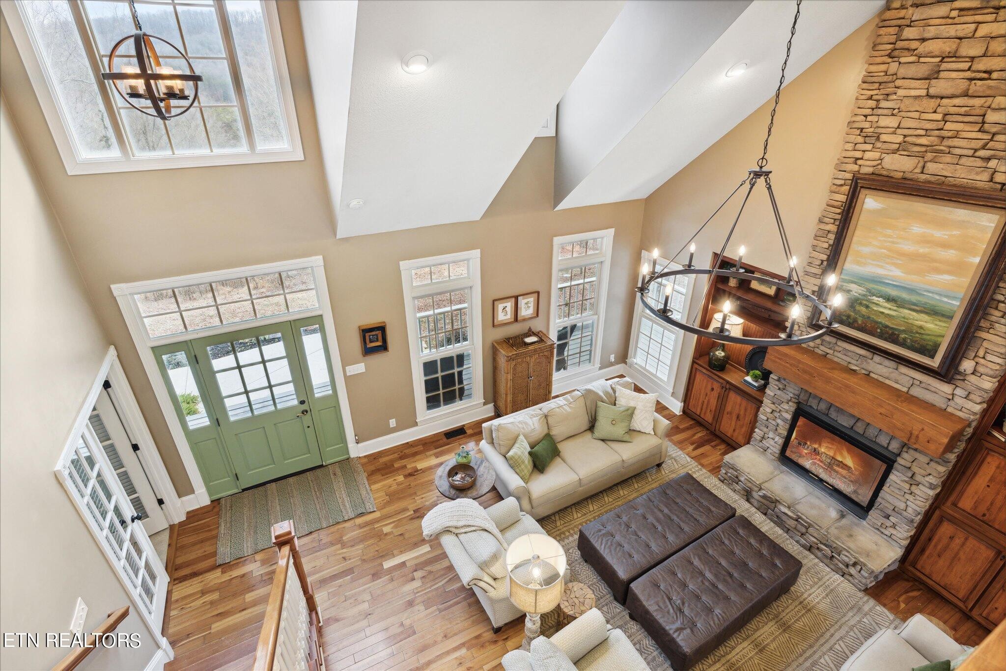 9245 Arlington Ridge Way Powell, TN 37849 - Photo 11 of 36 a living room with furniture and wooden floor