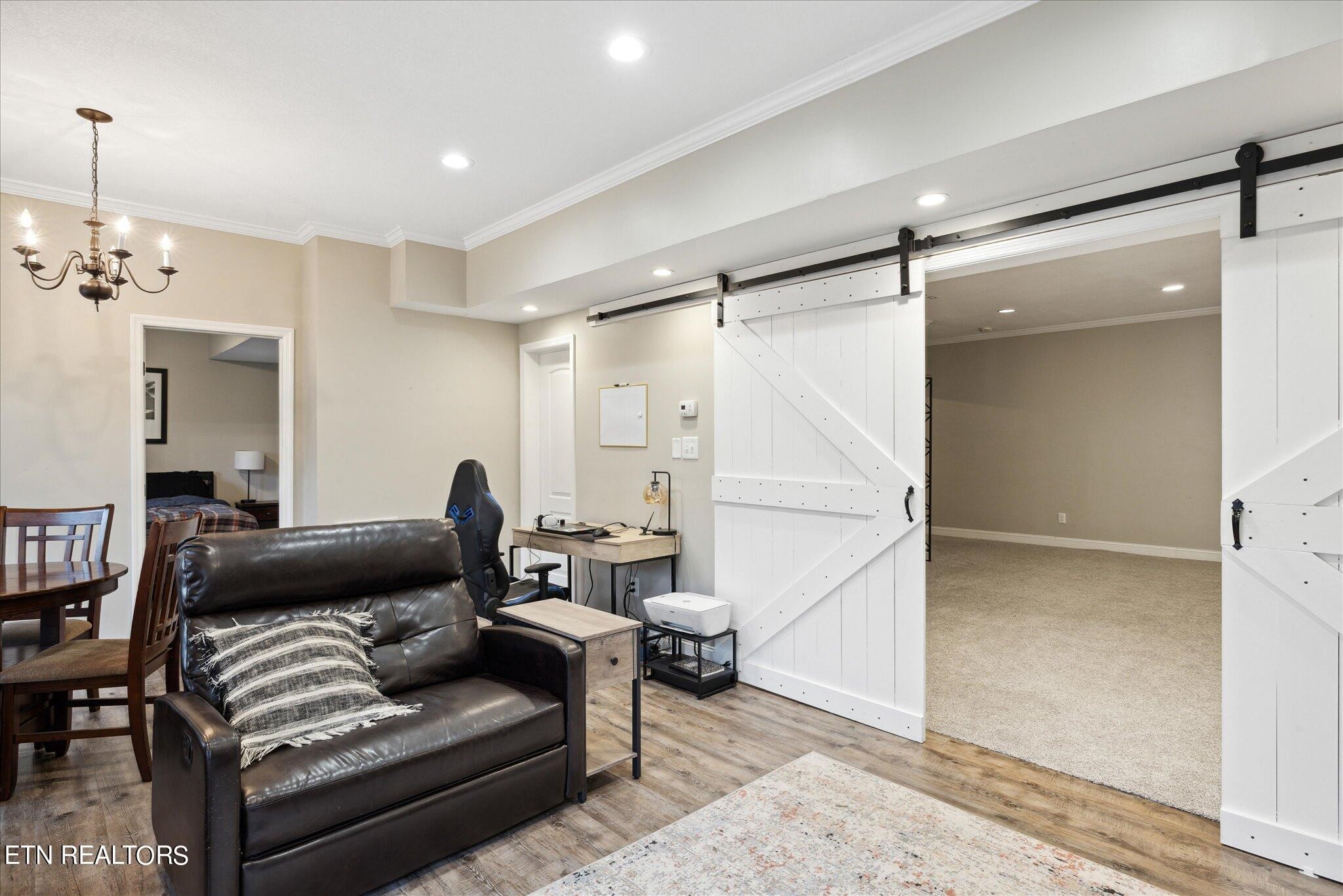 9245 Arlington Ridge Way Powell, TN 37849 - Photo 18 of 36 a living room with furniture and a ceiling fan