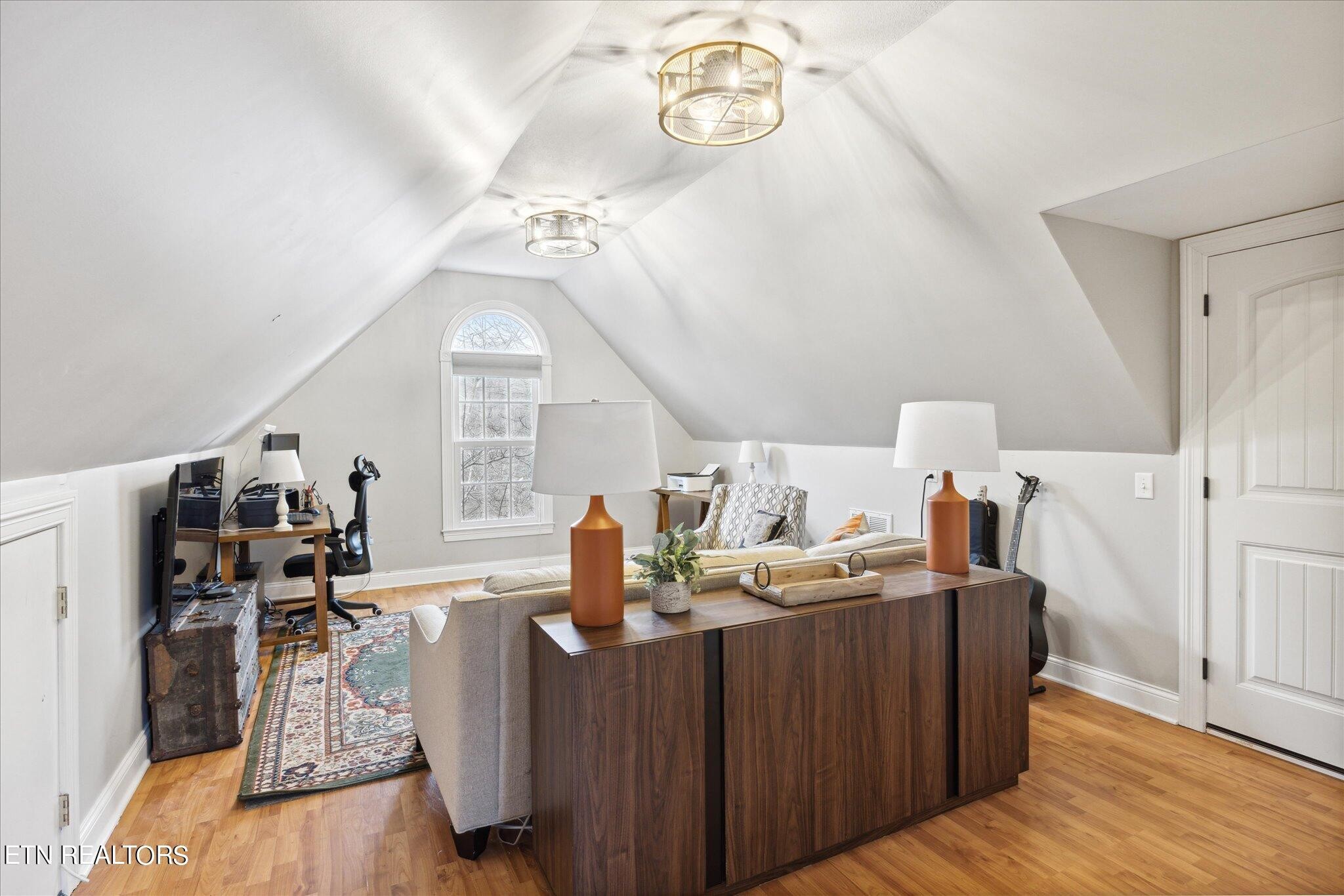 9245 Arlington Ridge Way Powell, TN 37849 - Photo 23 of 36 a living room with furniture and a wooden floor