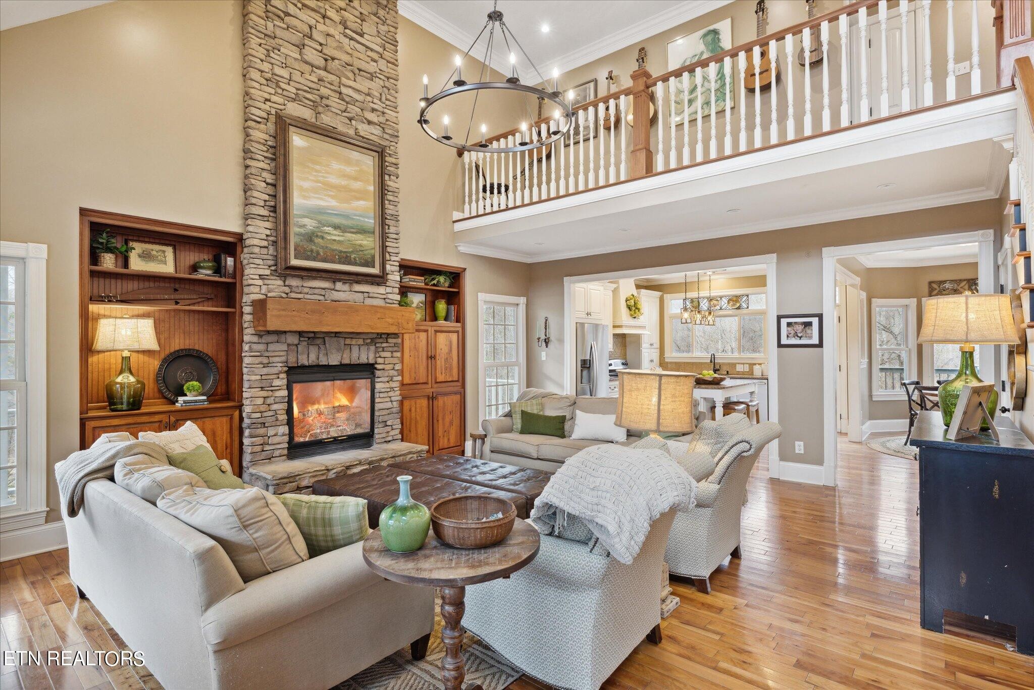 9245 Arlington Ridge Way Powell, TN 37849 - Photo 3 of 36 a living room with furniture and a fireplace