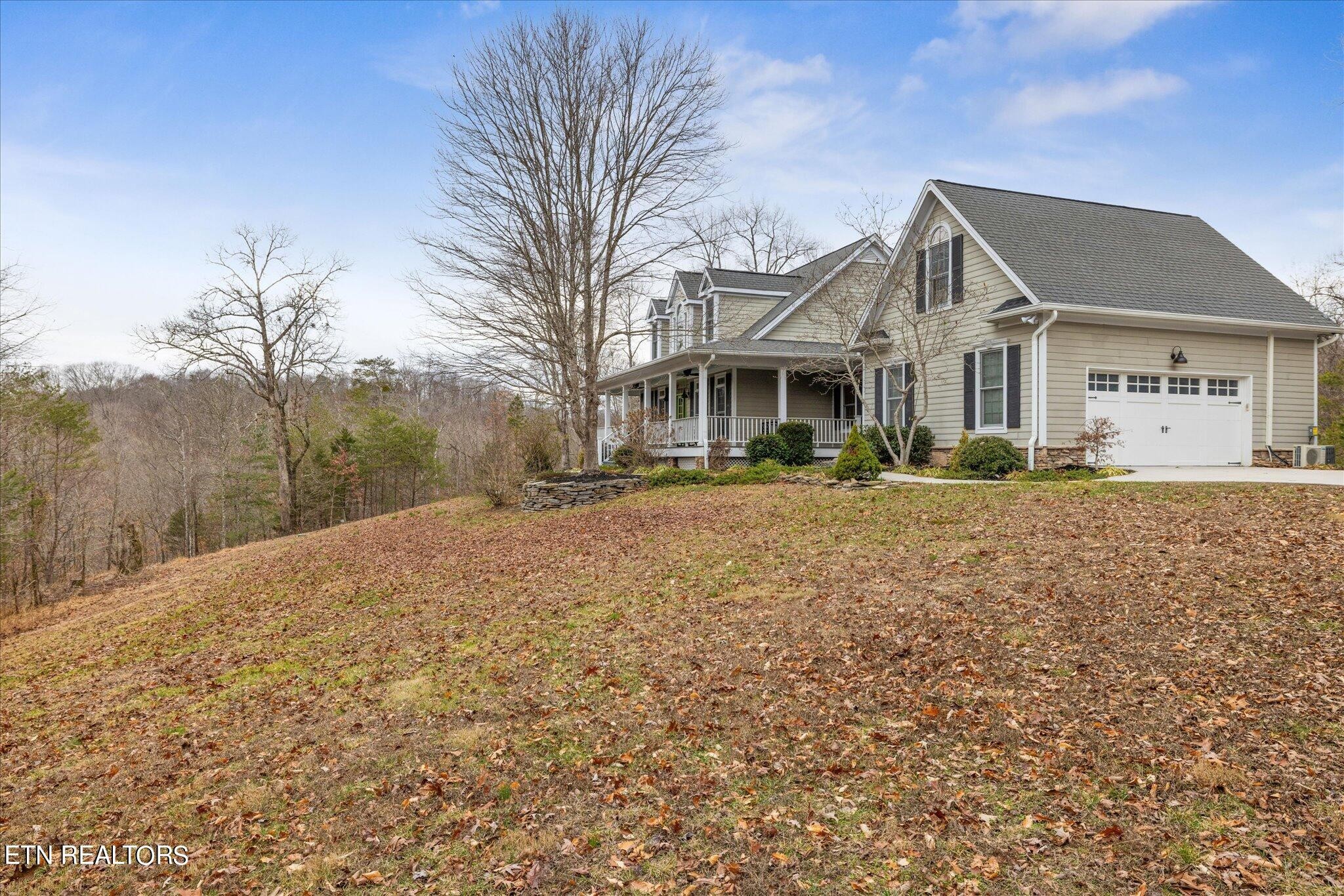 9245 Arlington Ridge Way Powell, TN 37849 - Photo 32 of 36 a front view of a house with a yard