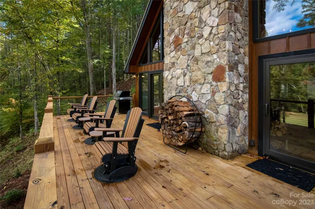 a view of a two chairs and table on the wooden floor