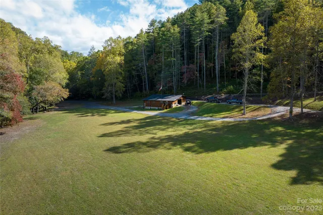 a view of a playground with basketball court
