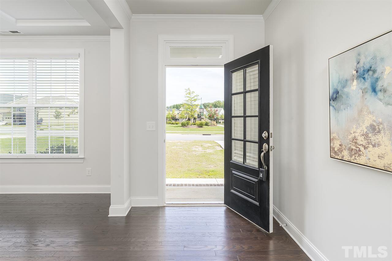 324 Morgan Ridge Road Holly Springs, NC 27540 - Photo 2 of 30 Gleaming engineered hardwood flooring and 9' ceilings.