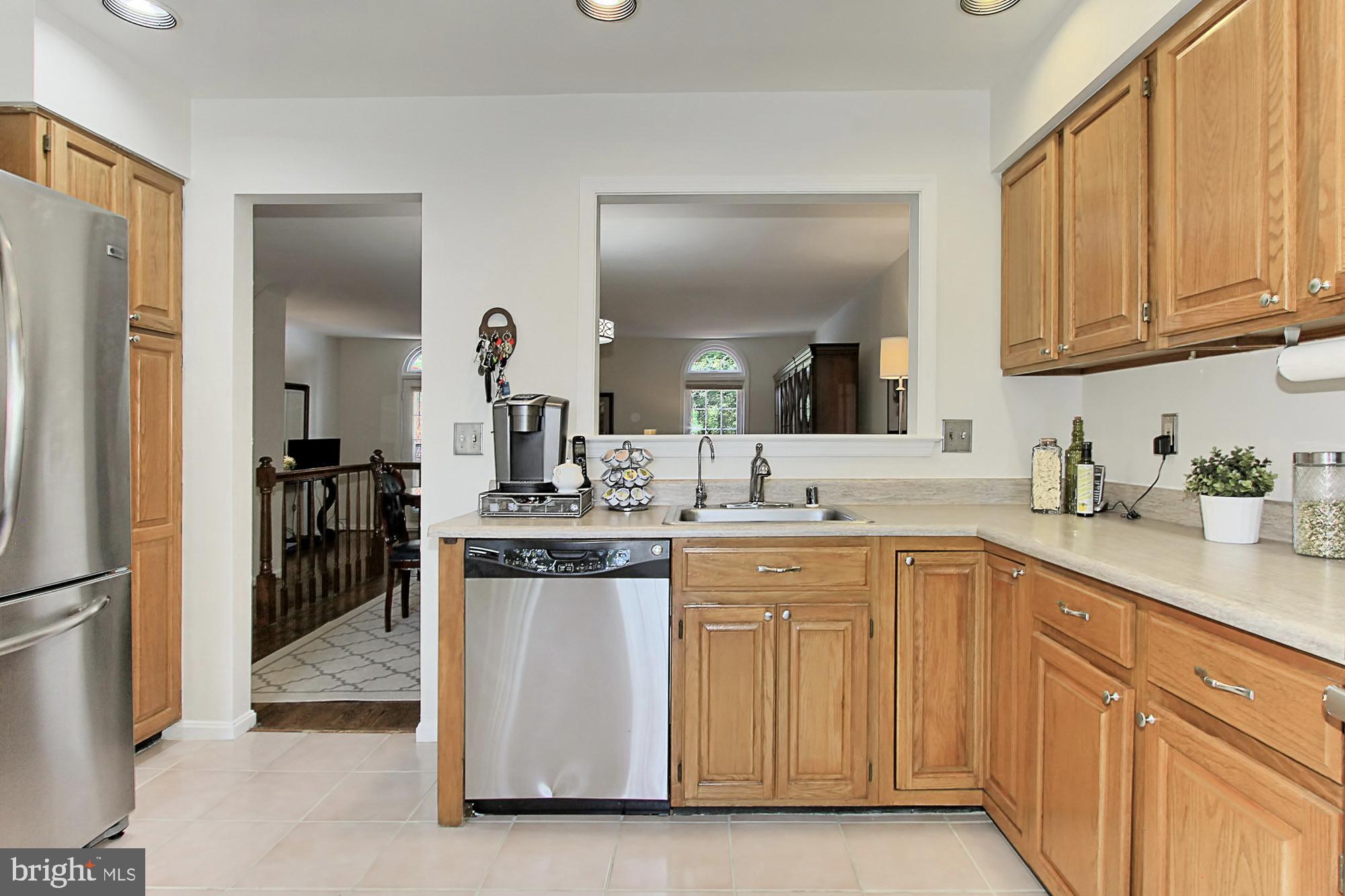7469 Ridge Oak Court Springfield, VA 22153 - Photo 8 of 18 The pass thru makes dinners a breeze.